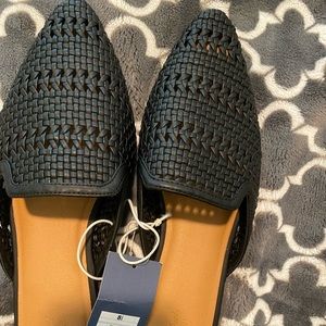 Black woven mules